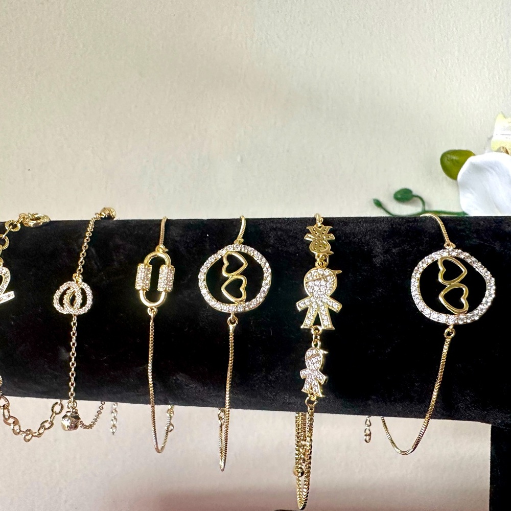 Stainless steel bracelet w/5 microns of real 14k gold
